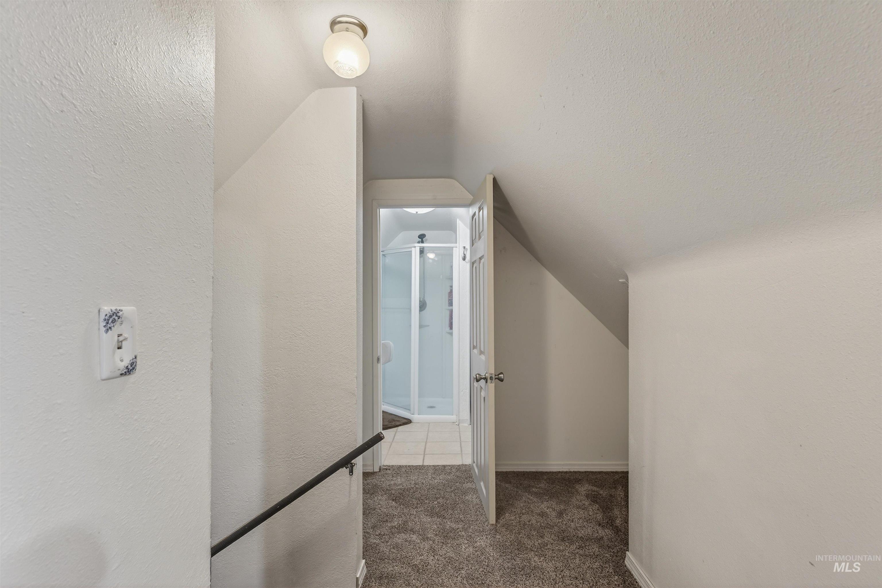 1266 Poplar Street Clarkston, WA 99403 - Photo 25 of 31 Corridor featuring carpet and baseboards