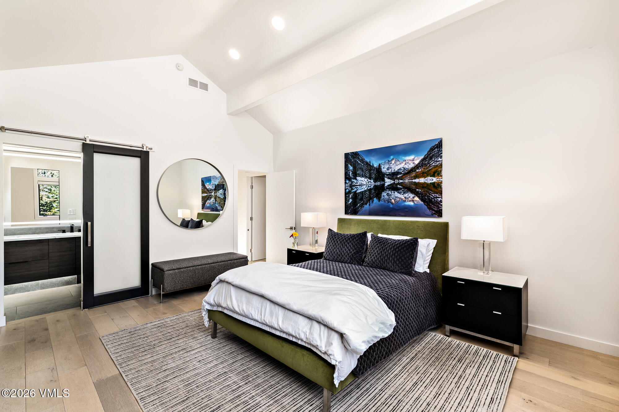 4515 Big Horn Road, Unit F Vail, CO 81657 - Photo 16 of 35 a bedroom with a bed and a painting on the wall