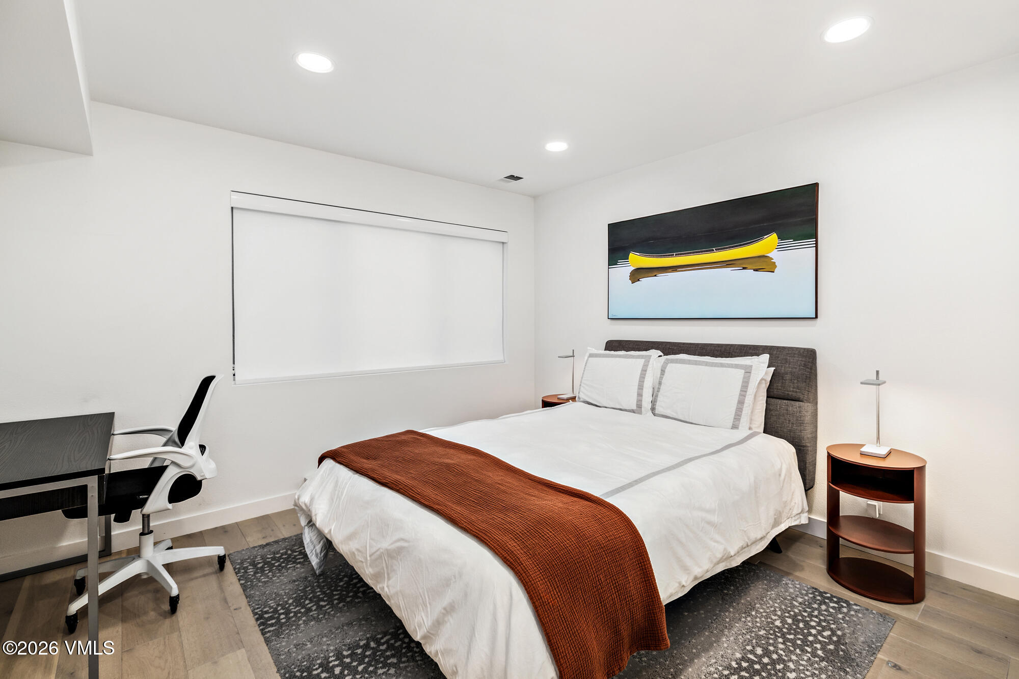 4515 Big Horn Road, Unit F Vail, CO 81657 - Photo 24 of 35 a bedroom with a bed and a desk