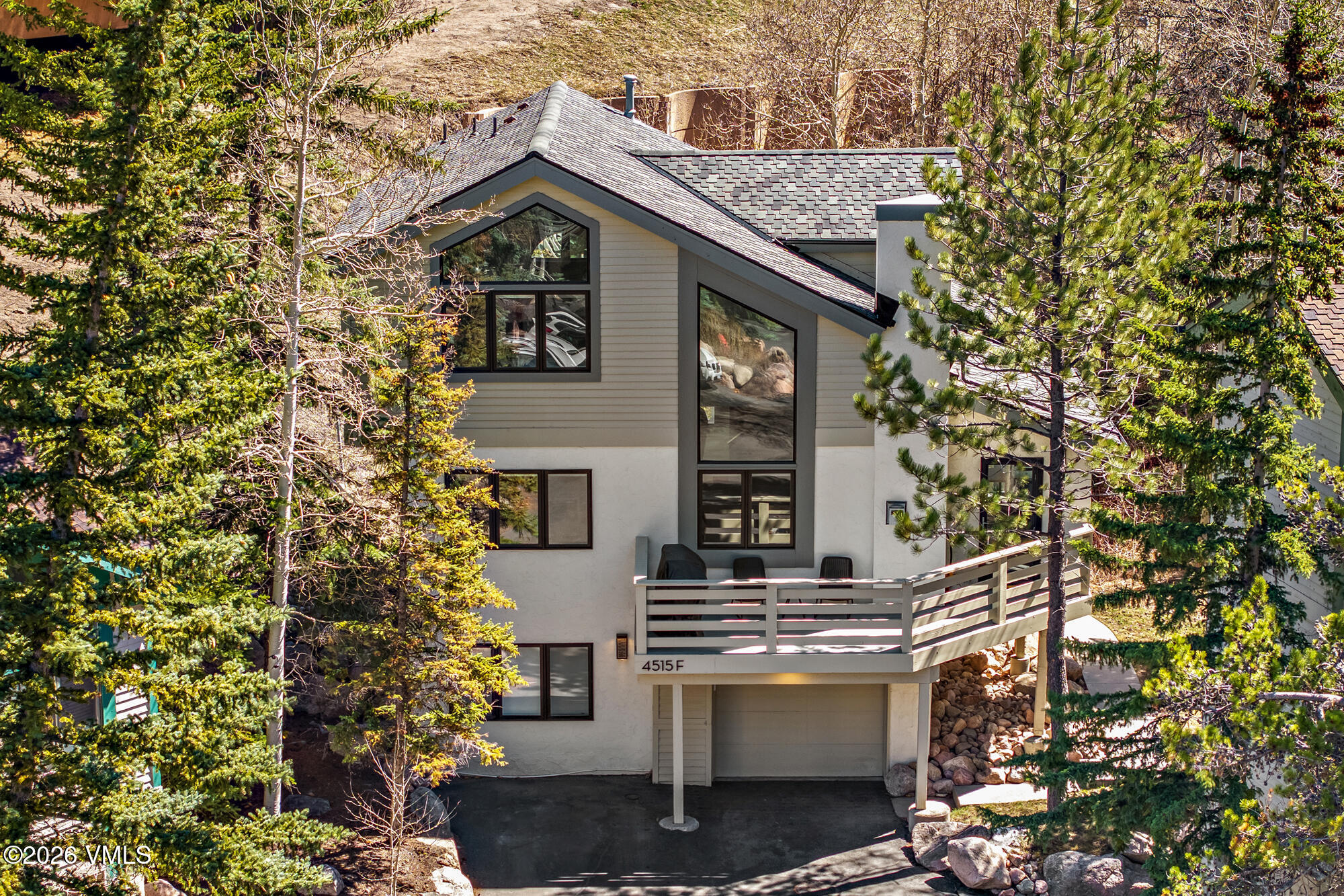 4515 Big Horn Road, Unit F Vail, CO 81657 - Photo 29 of 35 a view of a house with a yard