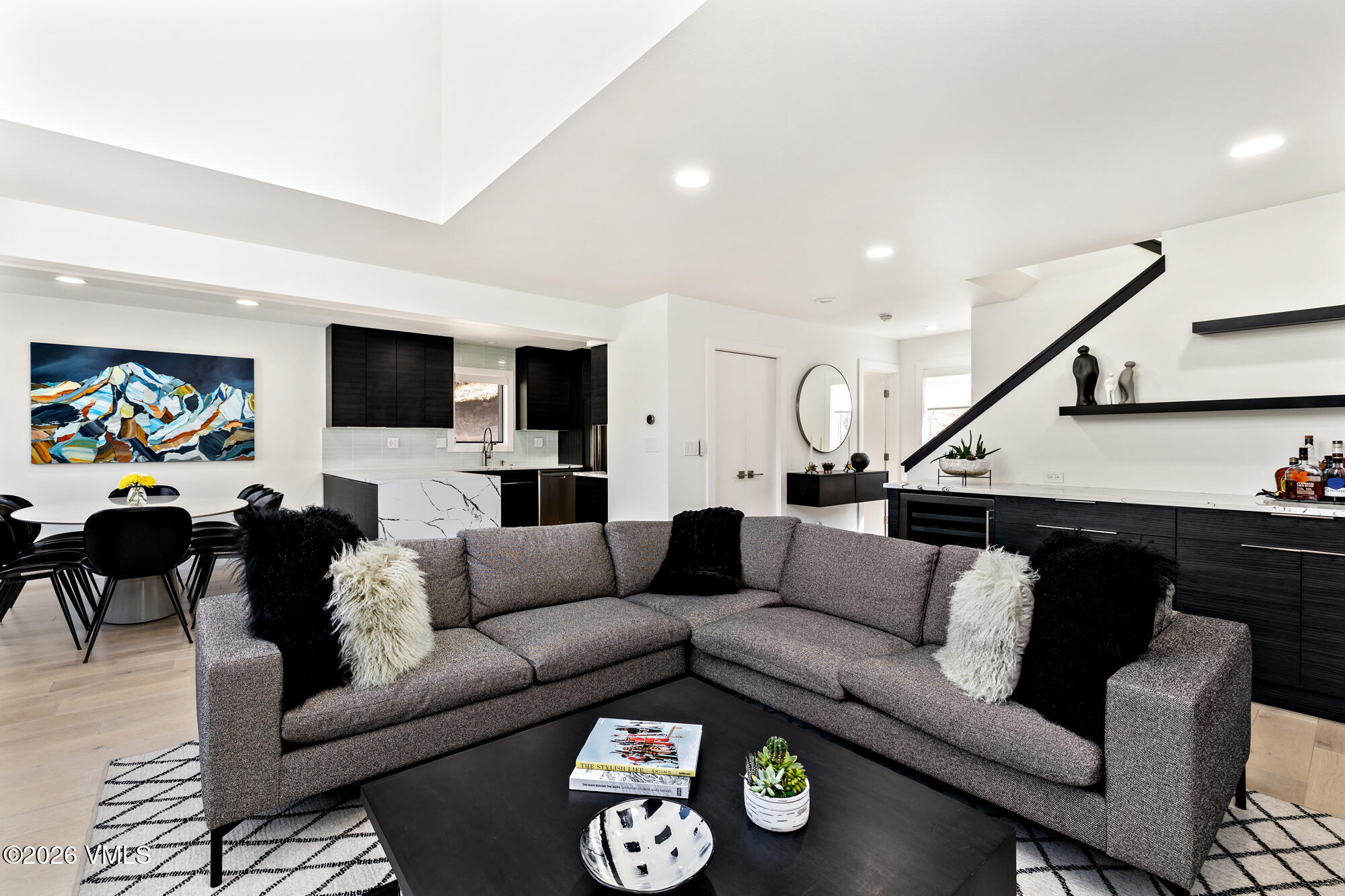 4515 Big Horn Road, Unit F Vail, CO 81657 - Photo 3 of 35 a living room with furniture and wooden floor