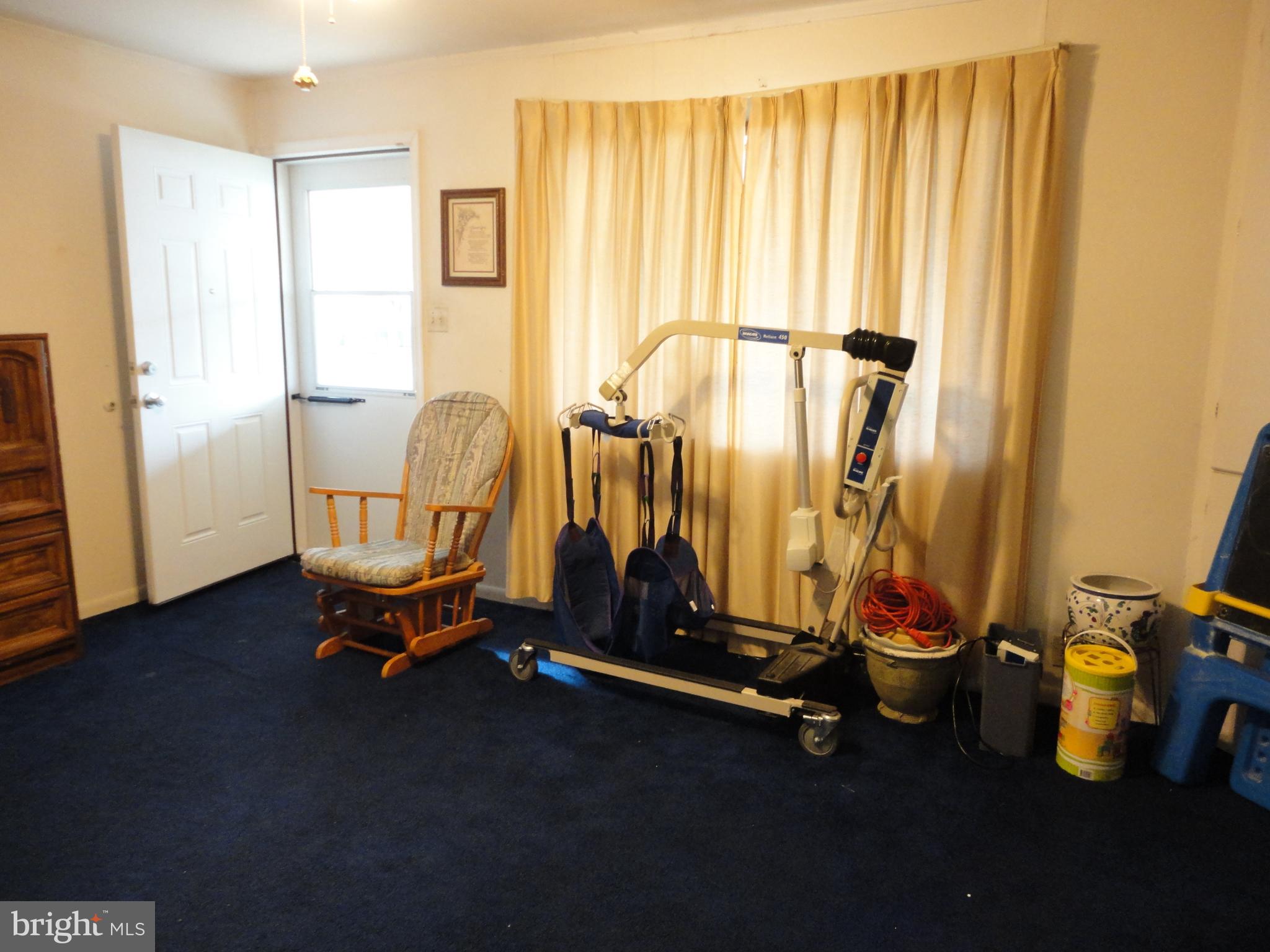 8201 Bullneck Road Baltimore, MD 21222 - Photo 16 of 33 Living room offers plenty of light!