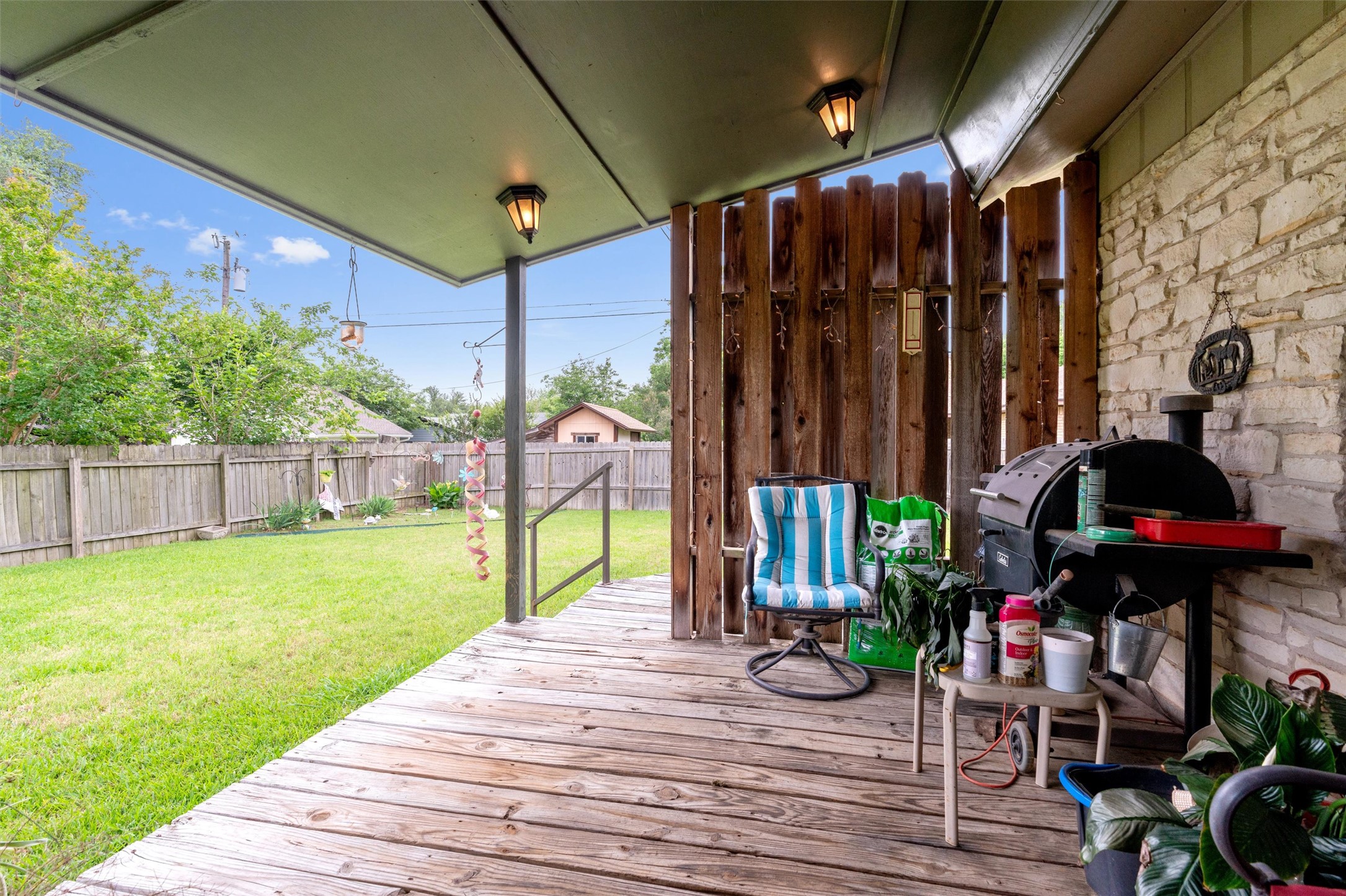 401 Drake Lane Taylor, TX 76574 - Photo 27 of 31 Covered wood-deck patio with integrated lighting