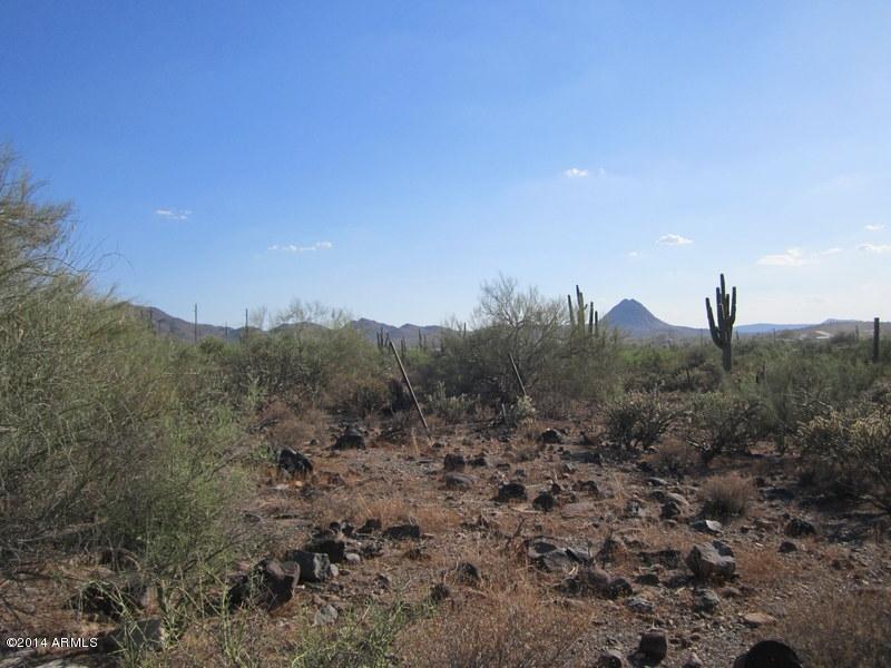 0 East Gravel Road, Unit Q New River, AZ 85087 - Photo 1 of 2 a view of a dry yard with a tree in the background