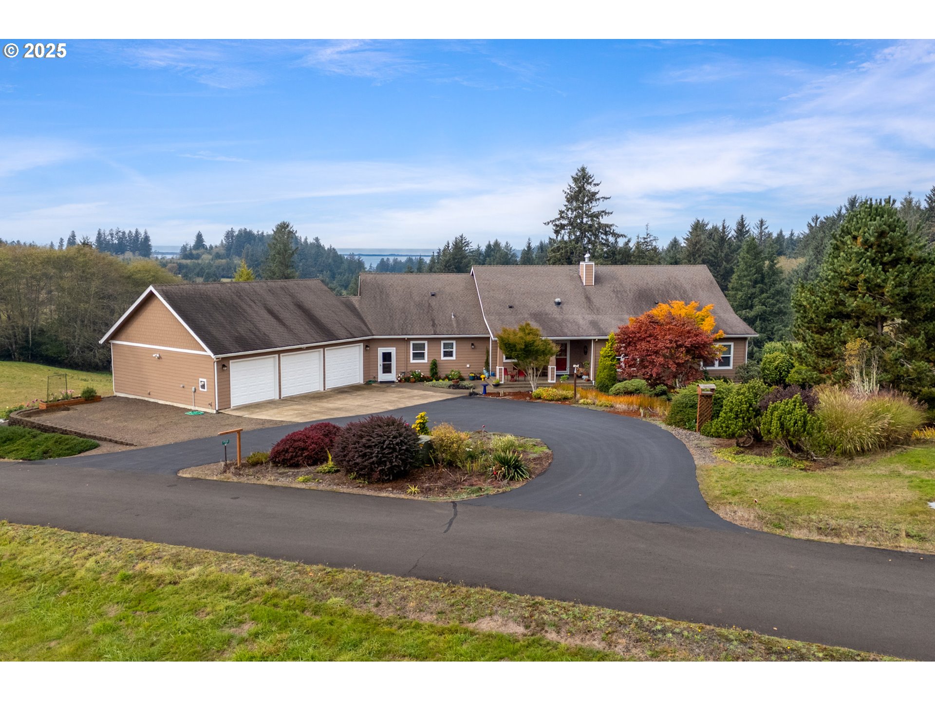 a aerial view of a house with a yard