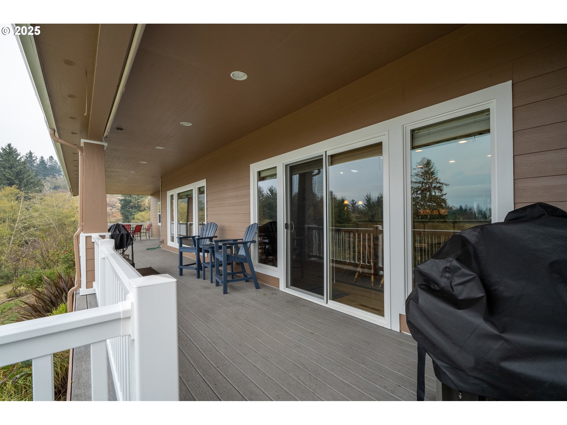 9500 Walz Hill Road Tillamook, OR 97141 - Photo 17 of 47 a living room with furniture and a large window