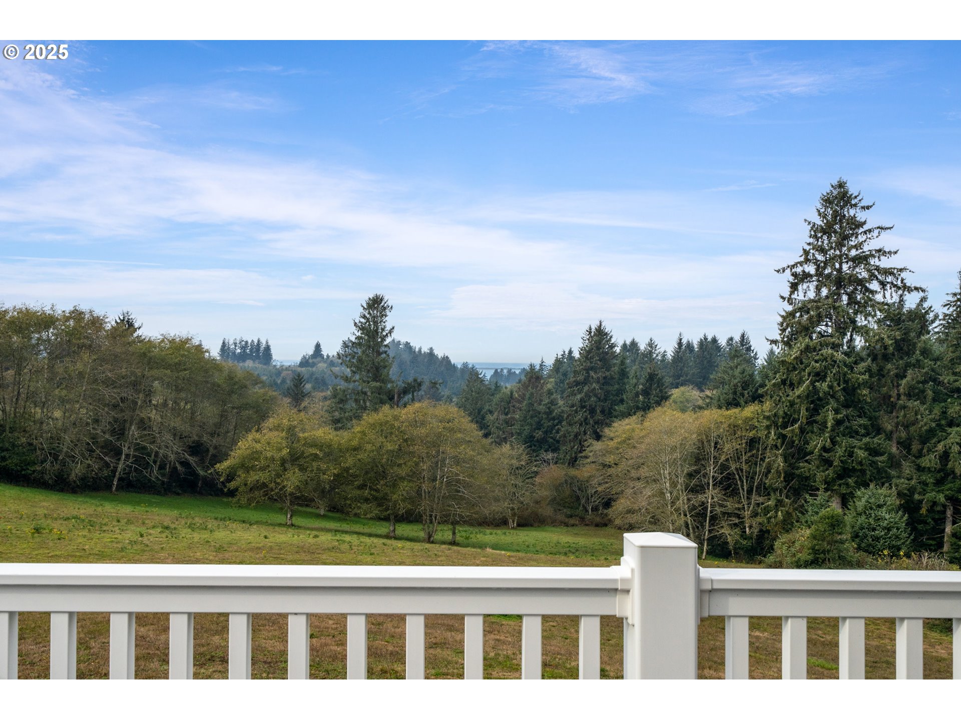 9500 Walz Hill Road Tillamook, OR 97141 - Photo 19 of 47 a view of an ocean from a balcony
