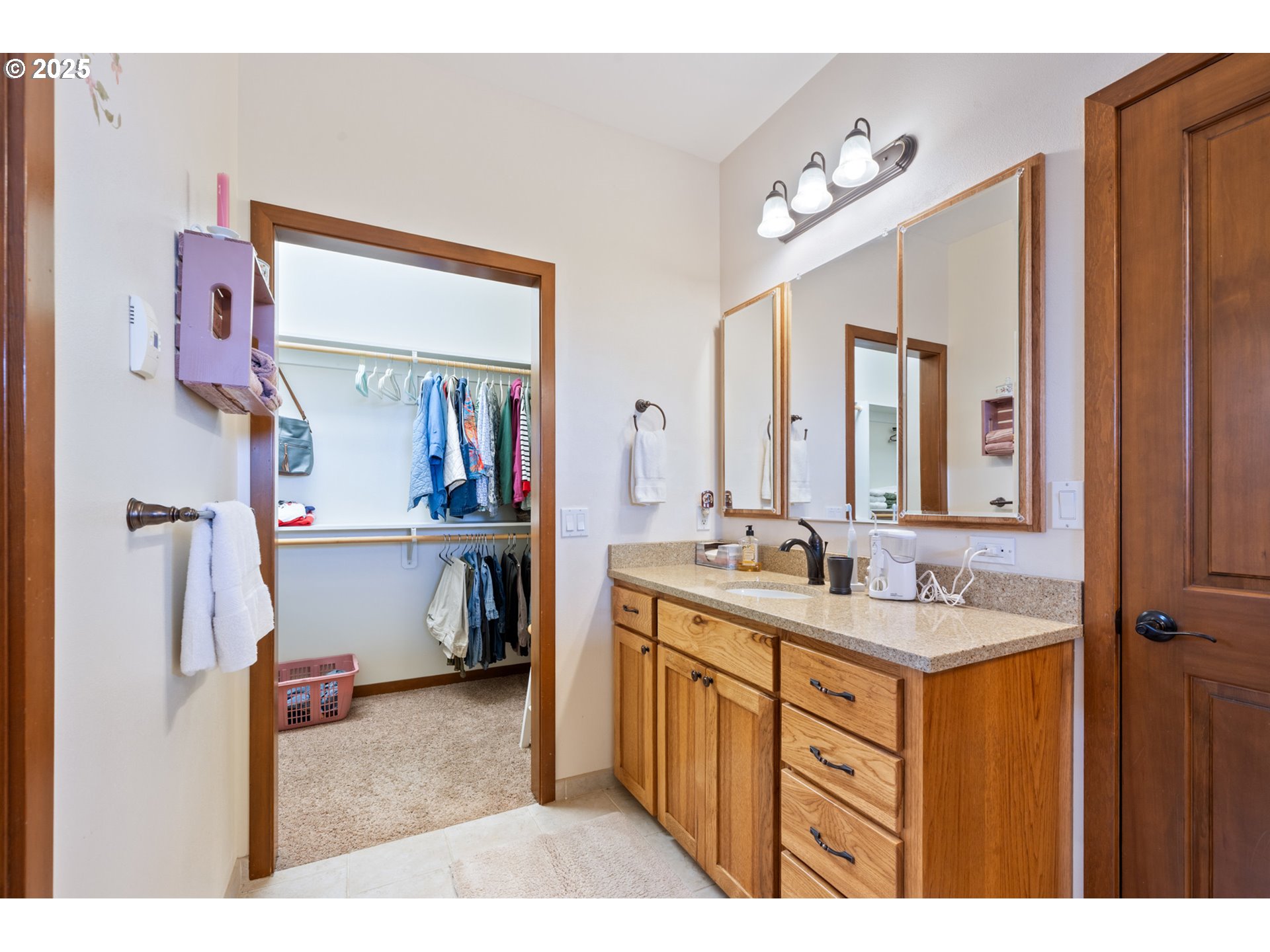 9500 Walz Hill Road Tillamook, OR 97141 - Photo 29 of 47 a bathroom with a sink vanity and mirror