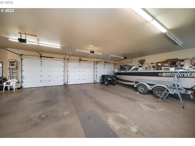 a view of a garage with furniture and a garage