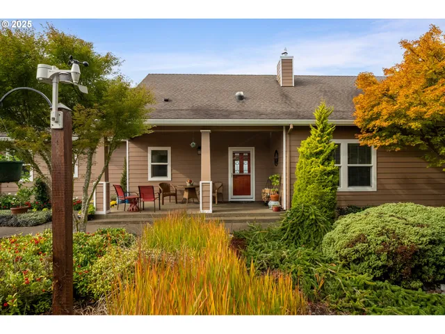 a view front of house with a yard outdoor seating and entertaining space