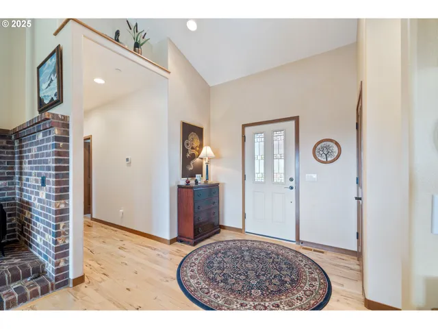 a view of livingroom with furniture and front door