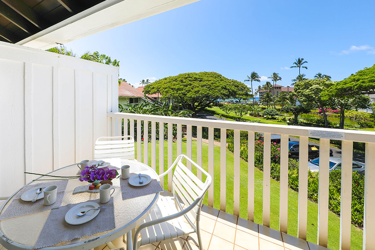 2253 Poipu Road, Unit 148 Koloa, HI 96756 - Photo 12 of 30 a view of a chairs and table on the terrace
