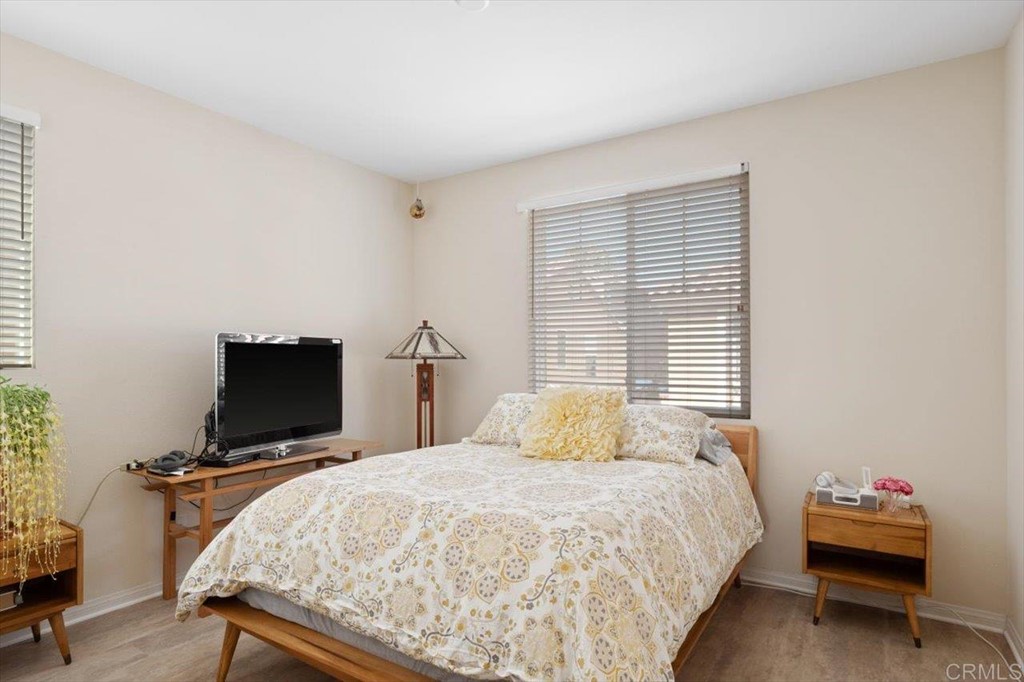 1347 Dolomite Way San Marcos, CA 92078 - Photo 14 of 23 a bedroom with a bed and a flat screen tv