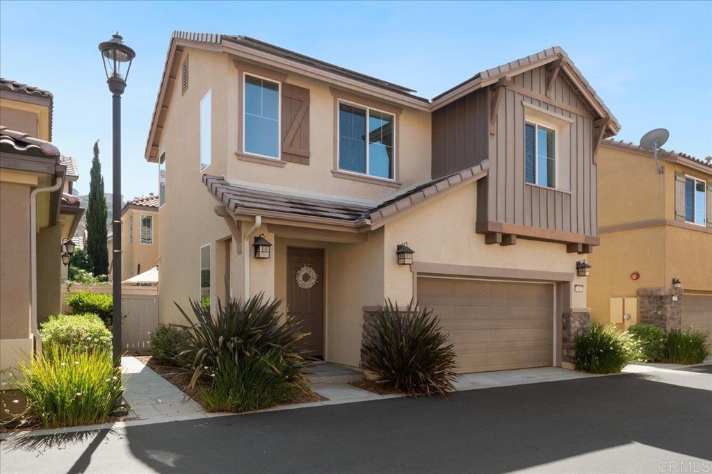 1347 Dolomite Way San Marcos, CA 92078 - Photo 3 of 23 a front view of a house with garden