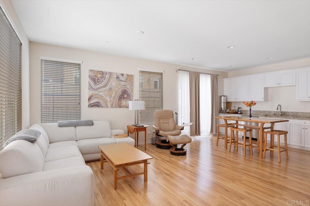 1347 Dolomite Way San Marcos, CA 92078 - Photo 4 of 23 a living room with furniture wooden floor and a window