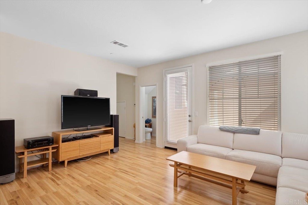 1347 Dolomite Way San Marcos, CA 92078 - Photo 6 of 23 a living room with furniture and a flat screen tv