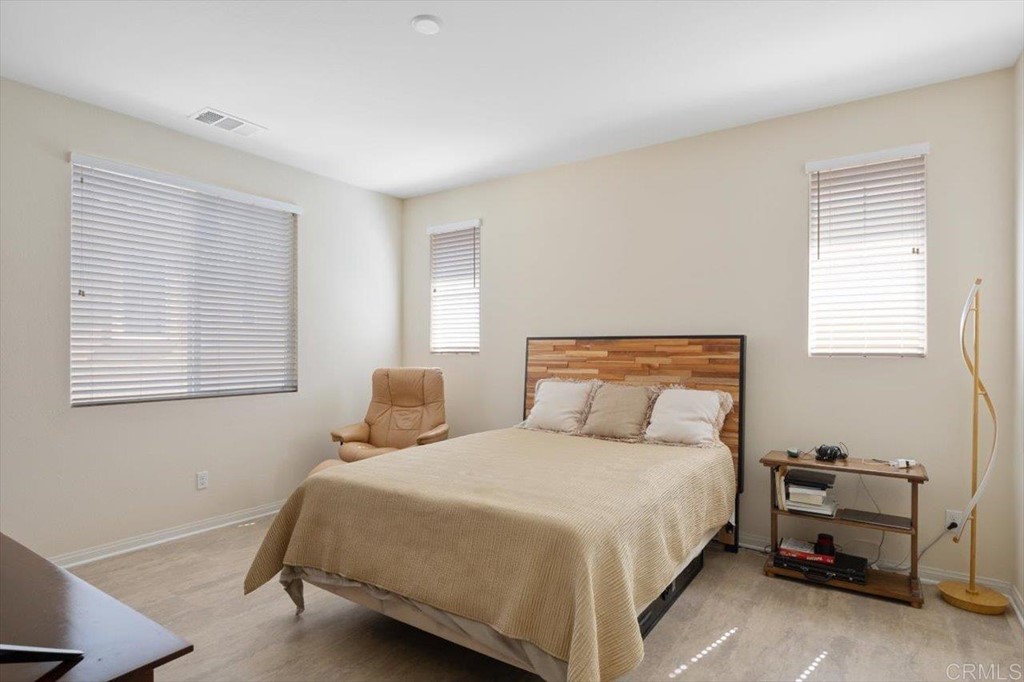 1347 Dolomite Way San Marcos, CA 92078 - Photo 10 of 23 a bedroom with a bed and a window