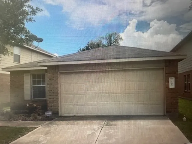 a kitchen with stainless steel appliances a refrigerator and a stove top oven