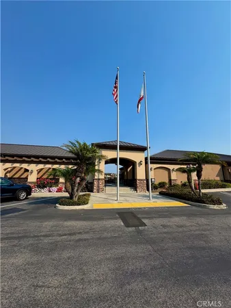 a view of a car park in front of house