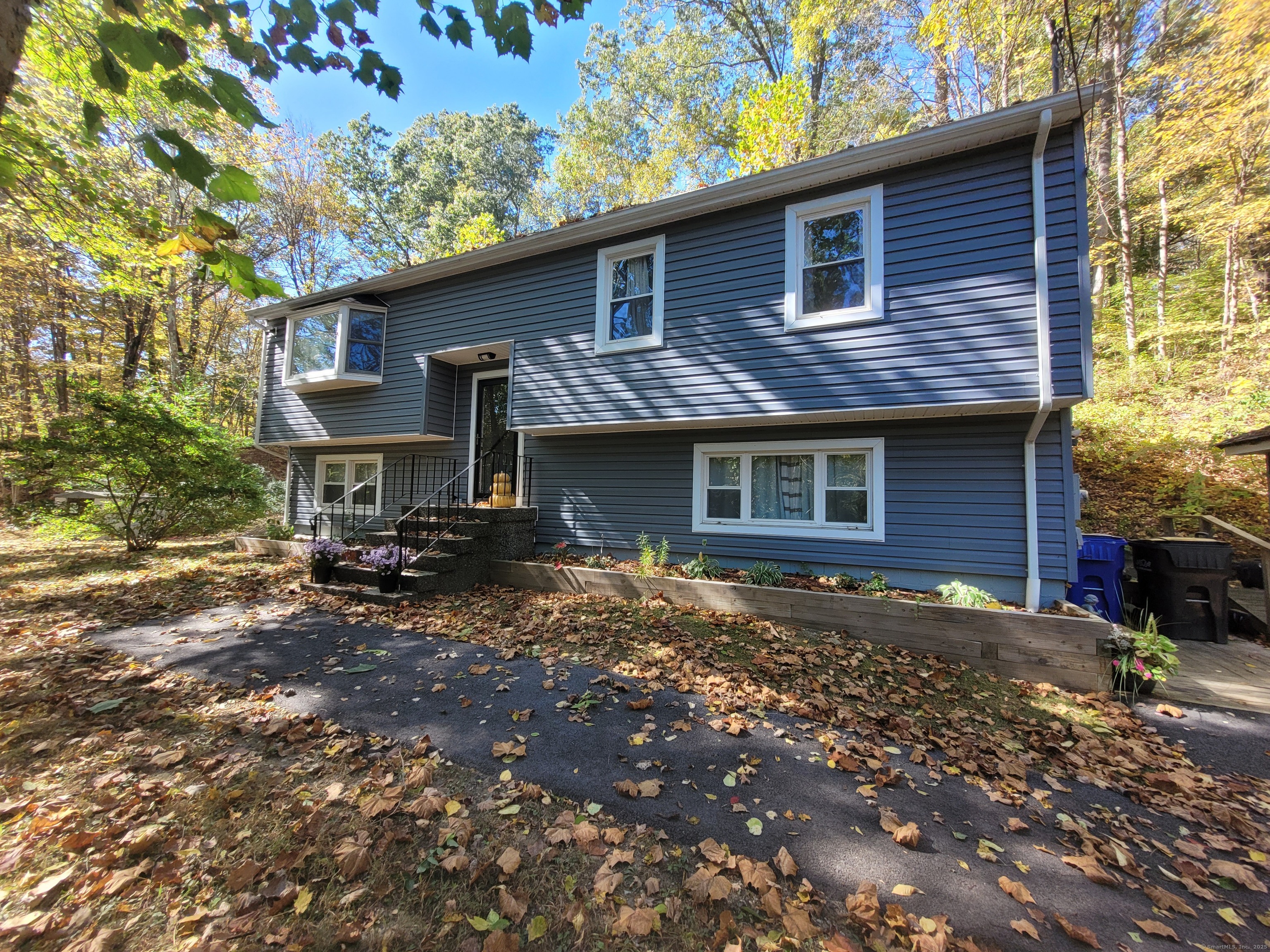 27 Paper Mill Road New Milford, CT 06776 - Photo 18 of 20 a view of a house with a yard