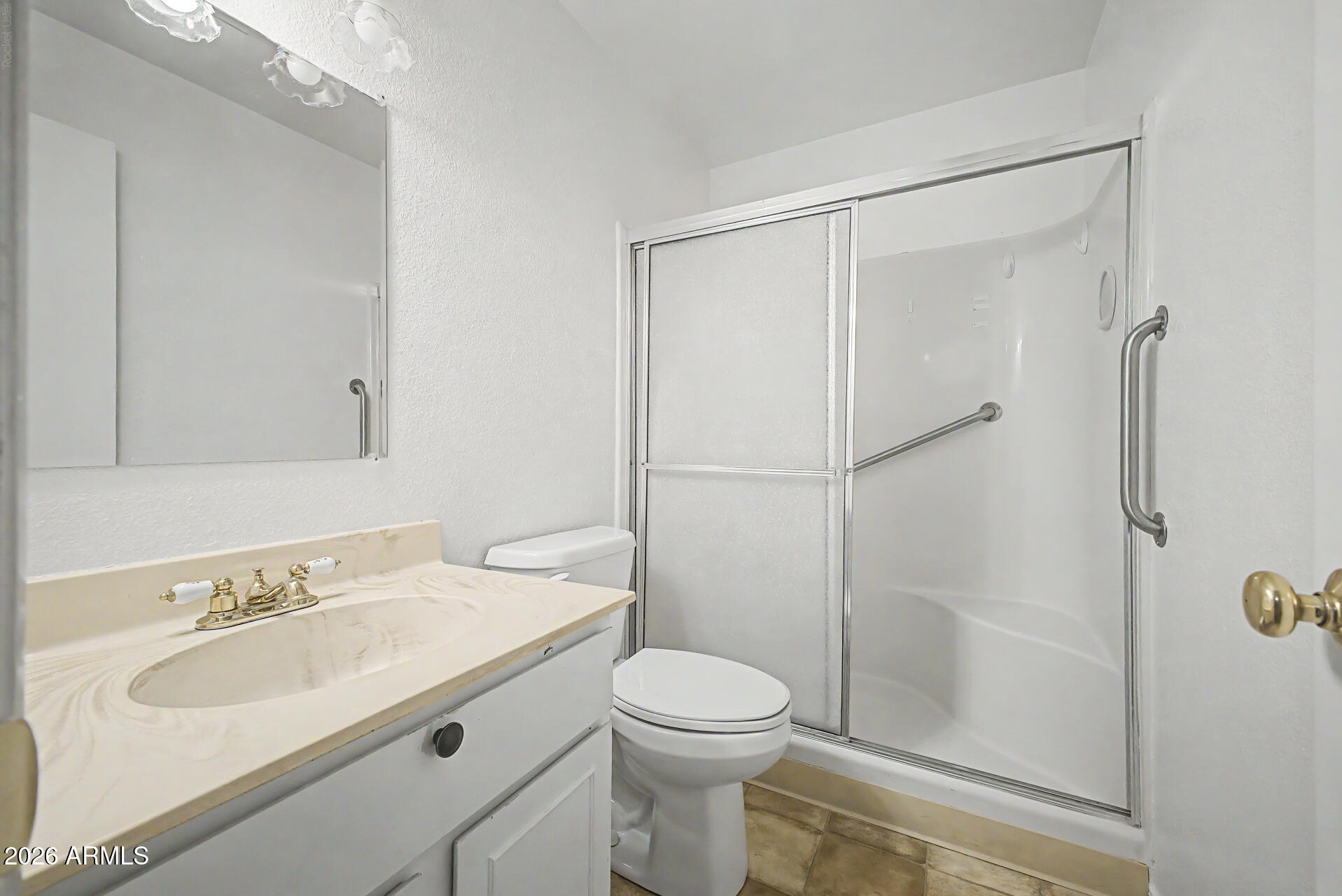 5873 East Thomas Road Scottsdale, AZ 85251 - Photo 17 of 30 a bathroom with a sink toilet and shower