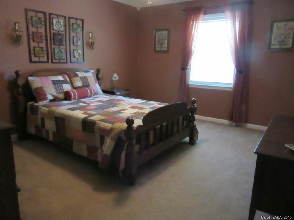 575 Russell Farm Road Kannapolis, NC 28081 - Photo 13 of 23 a bedroom with a bed rug and window