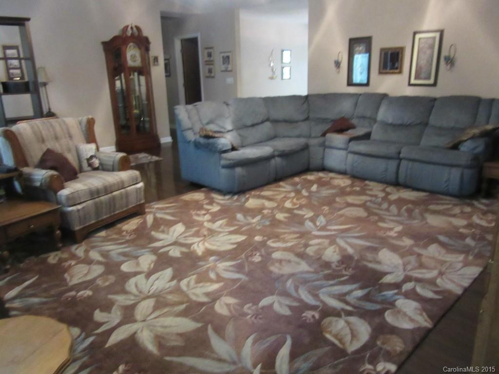 575 Russell Farm Road Kannapolis, NC 28081 - Photo 5 of 23 a large living room with a couch