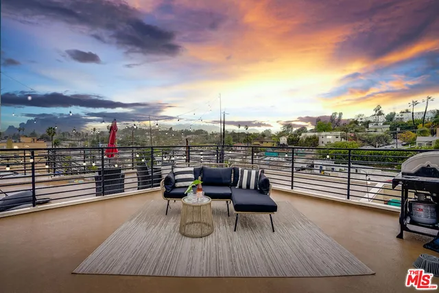 a view of a terrace with seating space