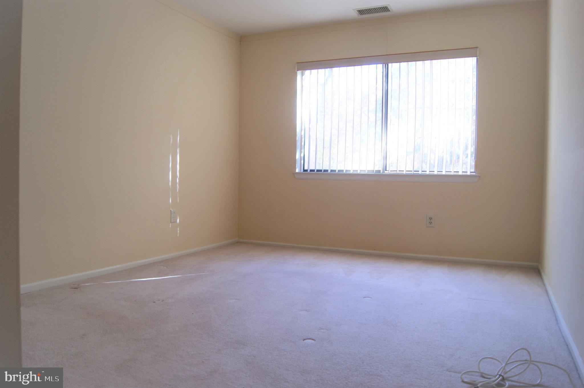 2901 Fallstaff Road, Unit 205 Baltimore, MD 21209 - Photo 17 of 24 an empty room with a window