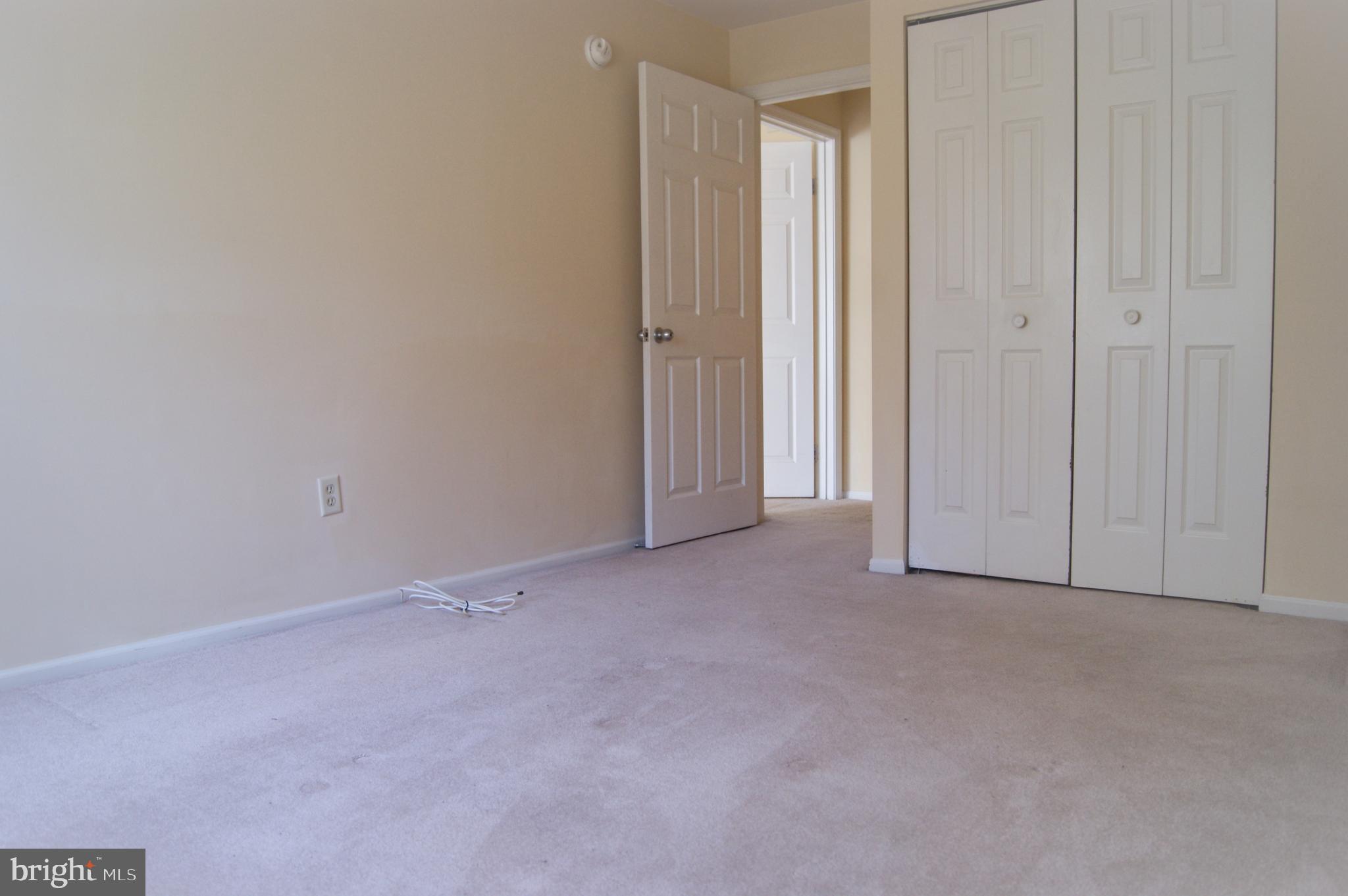 2901 Fallstaff Road, Unit 205 Baltimore, MD 21209 - Photo 18 of 24 an empty room with closet area
