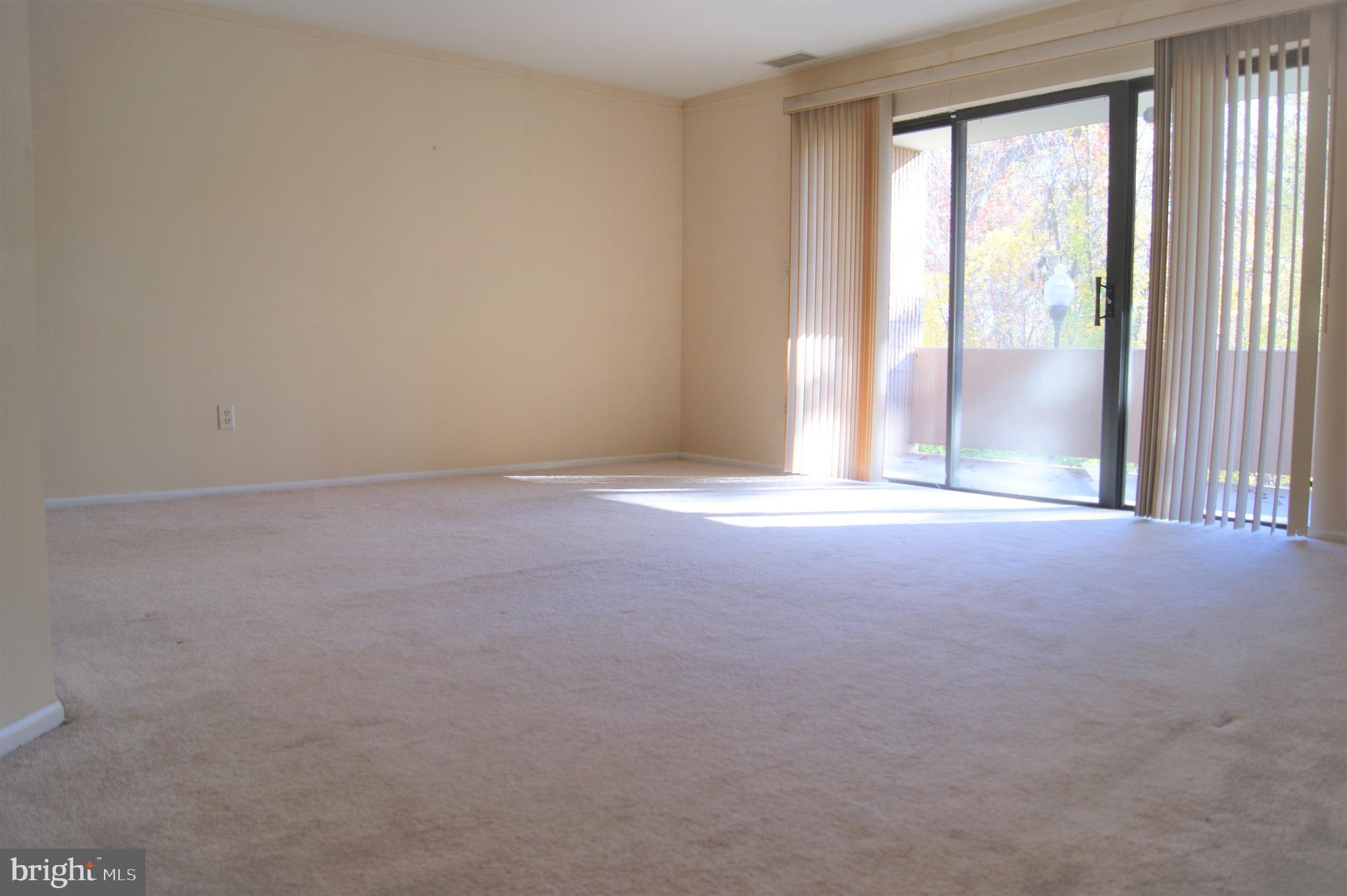 2901 Fallstaff Road, Unit 205 Baltimore, MD 21209 - Photo 5 of 24 an empty room with windows