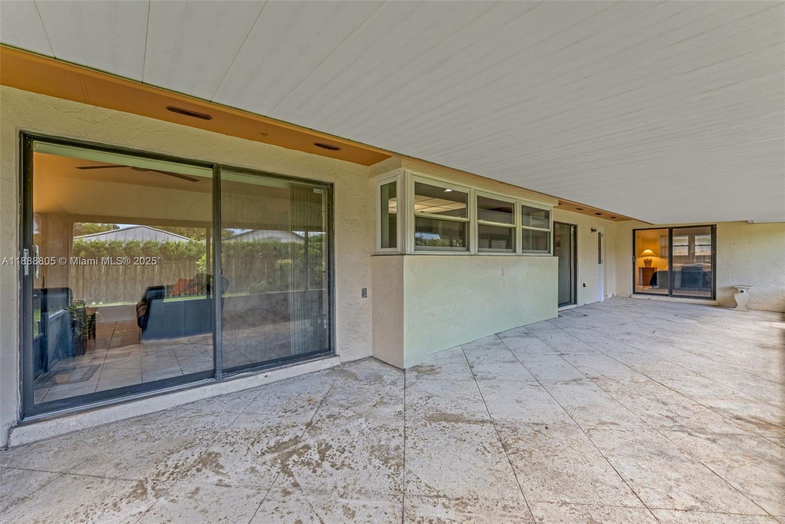 11614 Southwest 101st Terrace Miami, FL 33176 - Photo 14 of 17 a view of backyard with a large tree