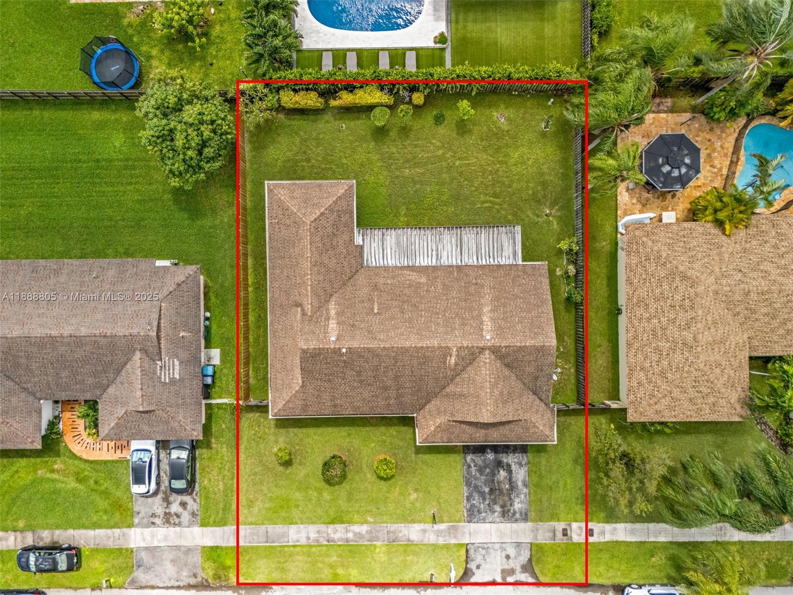 11614 Southwest 101st Terrace Miami, FL 33176 - Photo 16 of 17 an aerial view of a house with a yard