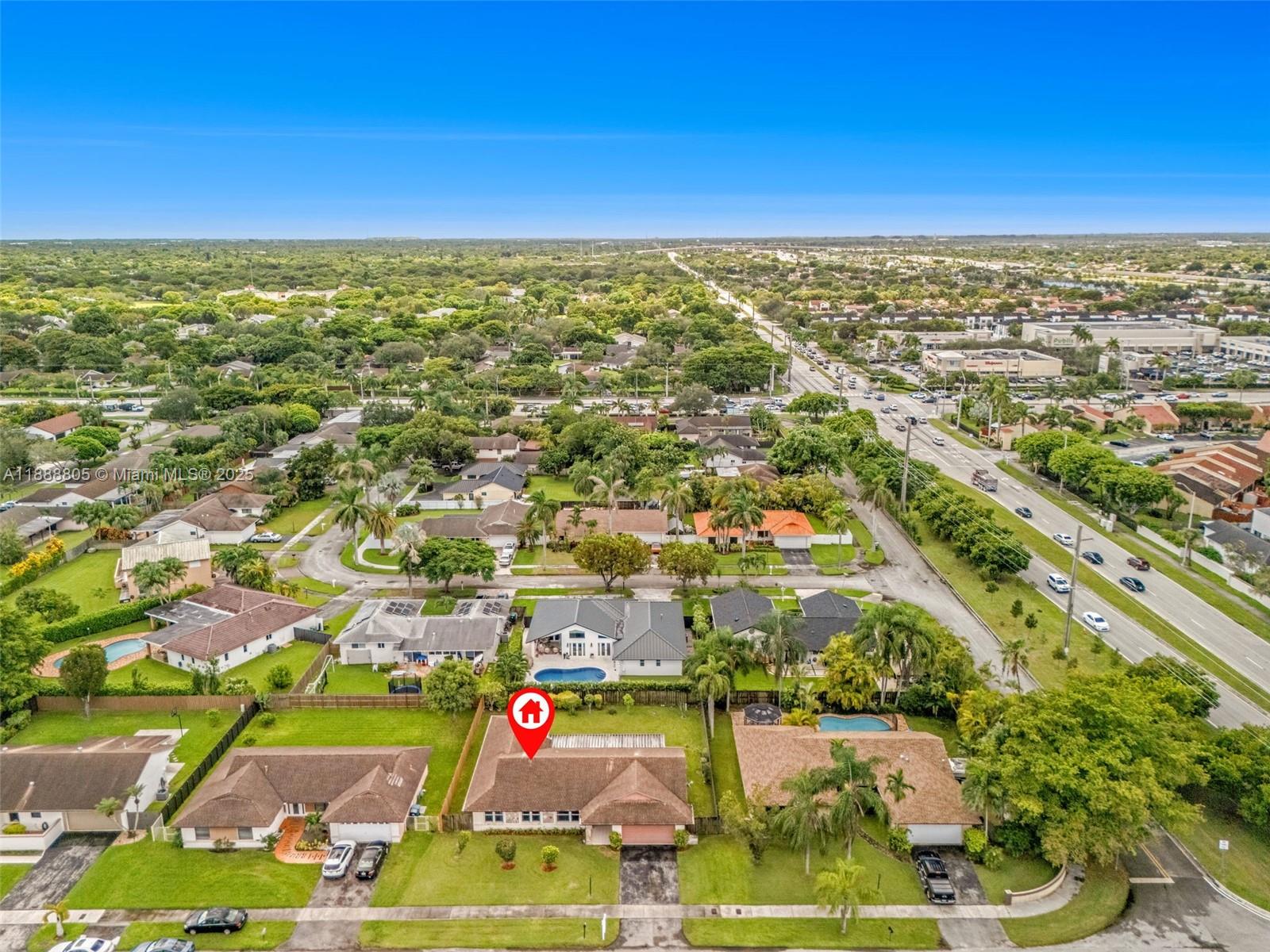 11614 Southwest 101st Terrace Miami, FL 33176 - Photo 17 of 17 an aerial view of residential houses with outdoor space and swimming pool