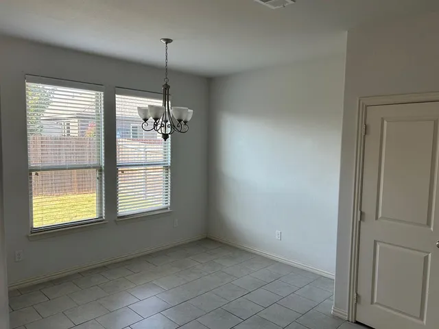 a view of an empty room with window