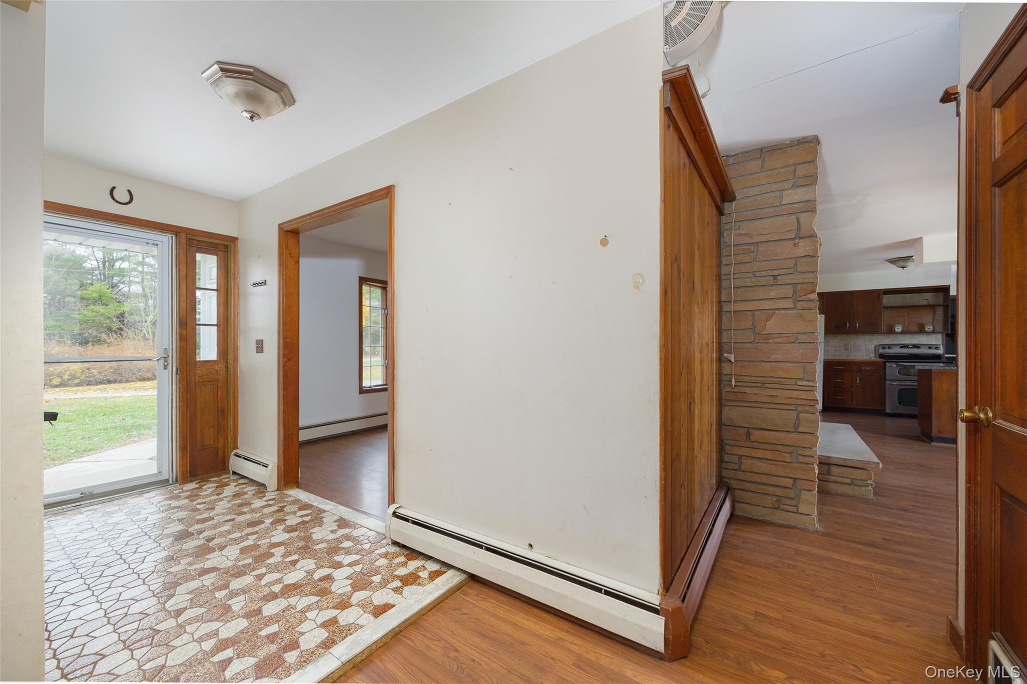 1 Peach Road Poughkeepsie, NY 12601 - Photo 14 of 22 a view of a hallway with wooden floor and closet