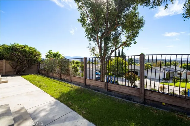 a view of a backyard with a garden