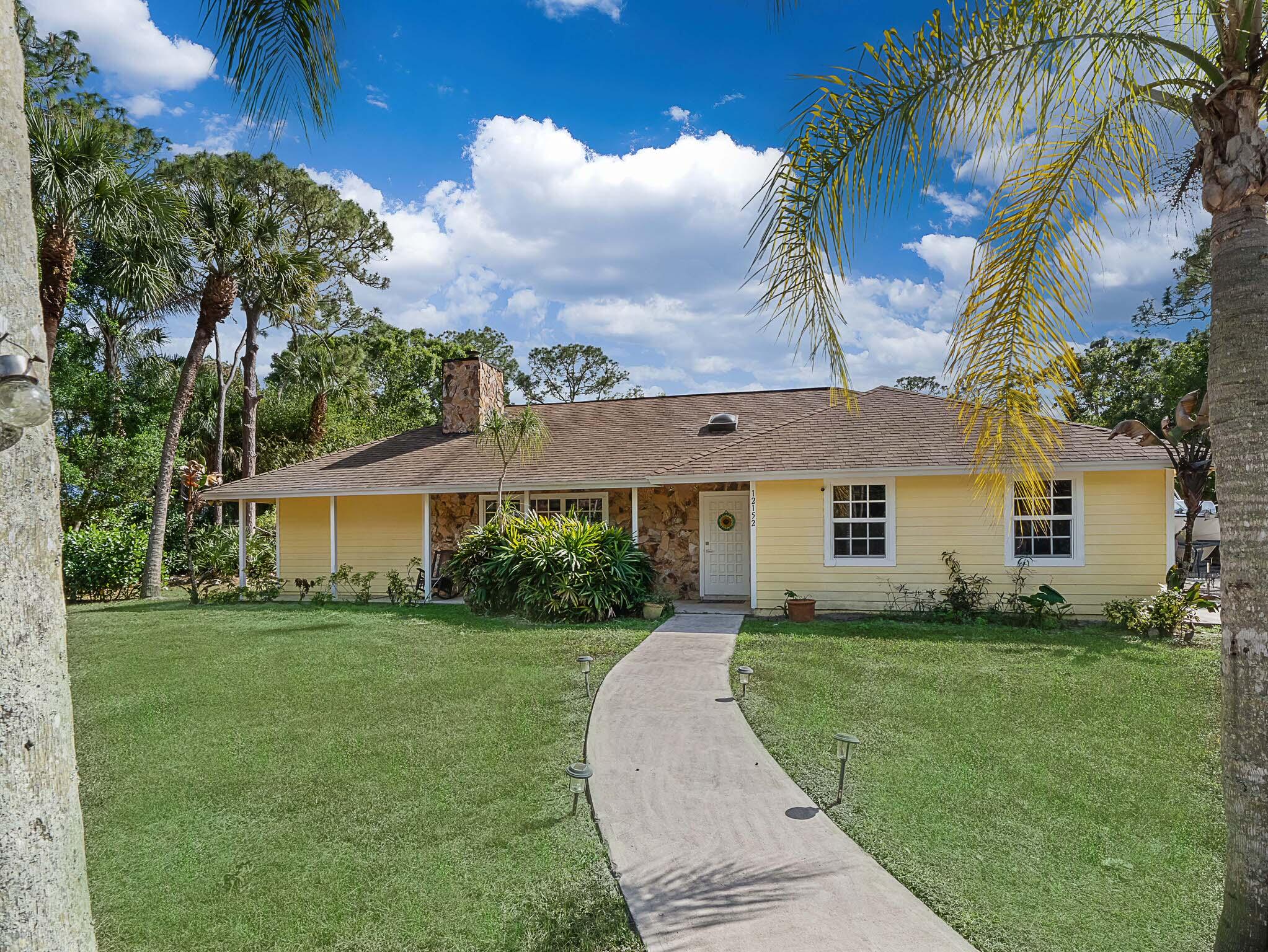 12152 188th Street North Jupiter, FL 33478 - Photo 3 of 76 1 Exterior (2)