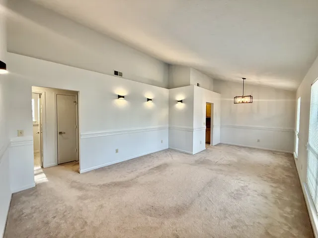 a view of a big room with a bathroom