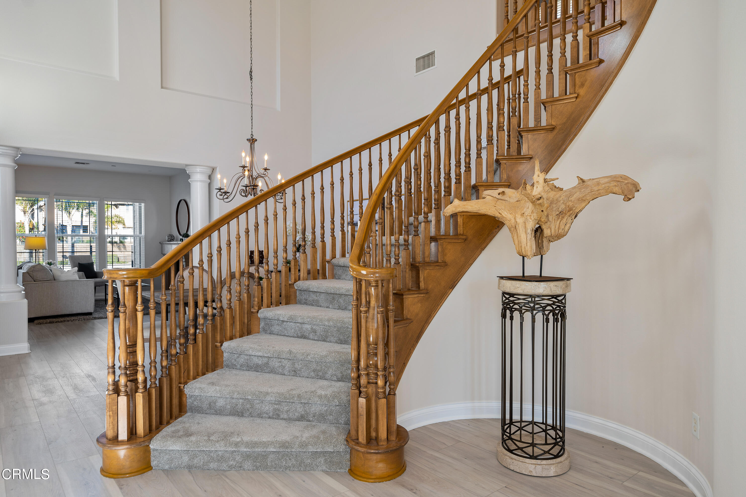 3957 West Hemlock Street Oxnard, CA 93035 - Photo 11 of 46 a view of entryway with wooden floor and stairs