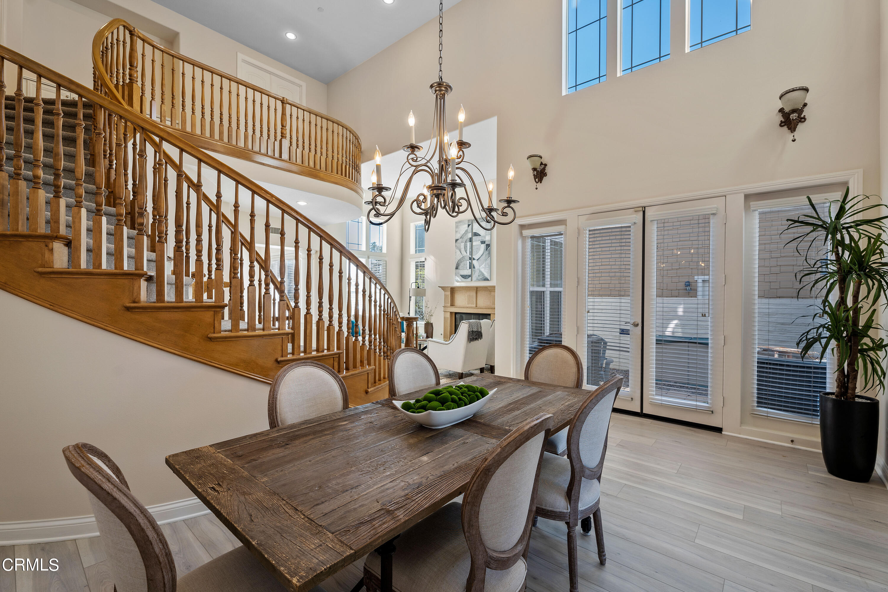3957 West Hemlock Street Oxnard, CA 93035 - Photo 30 of 46 a view of a dining room with furniture and wooden floor