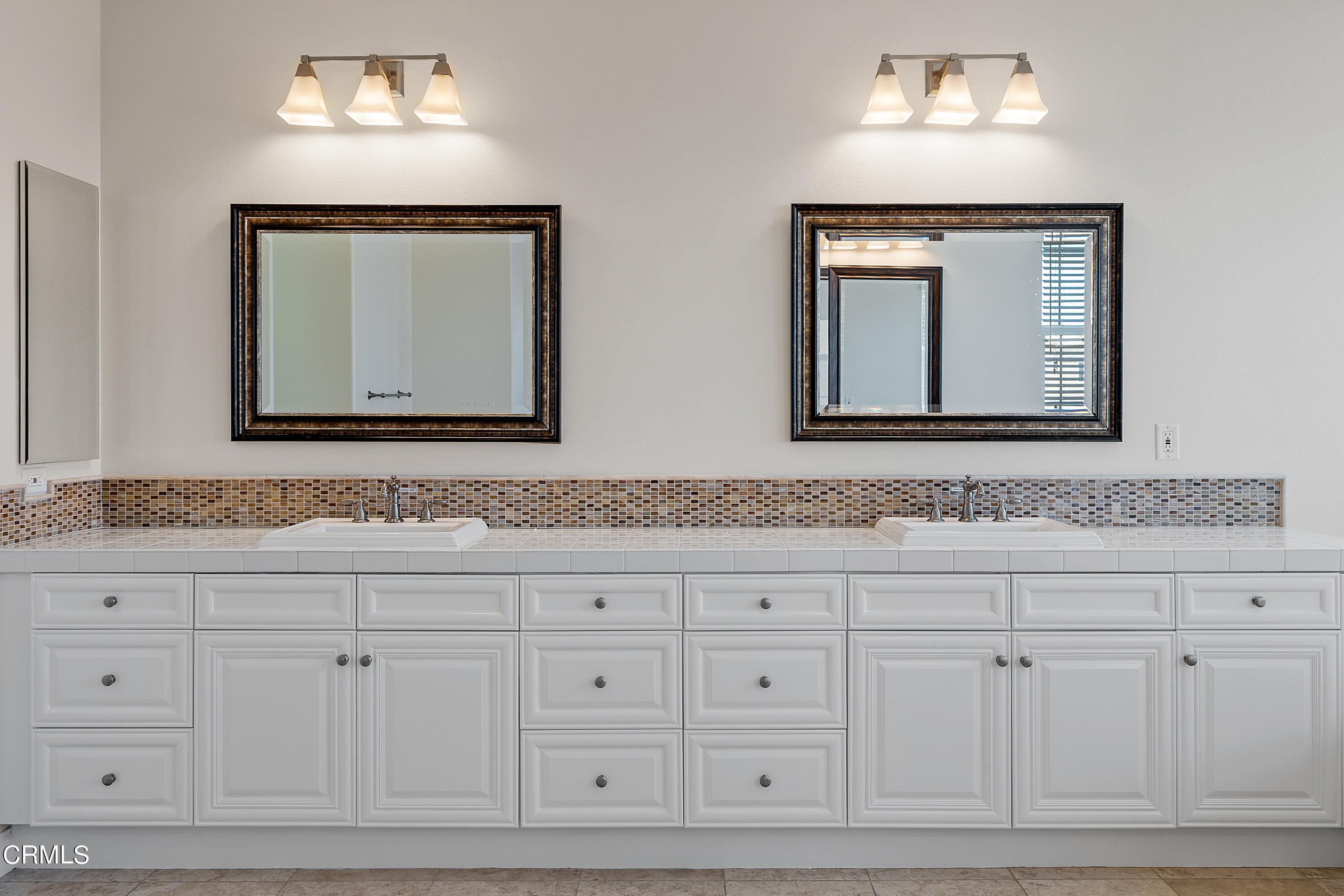 3957 West Hemlock Street Oxnard, CA 93035 - Photo 41 of 46 a bathroom with white cabinets