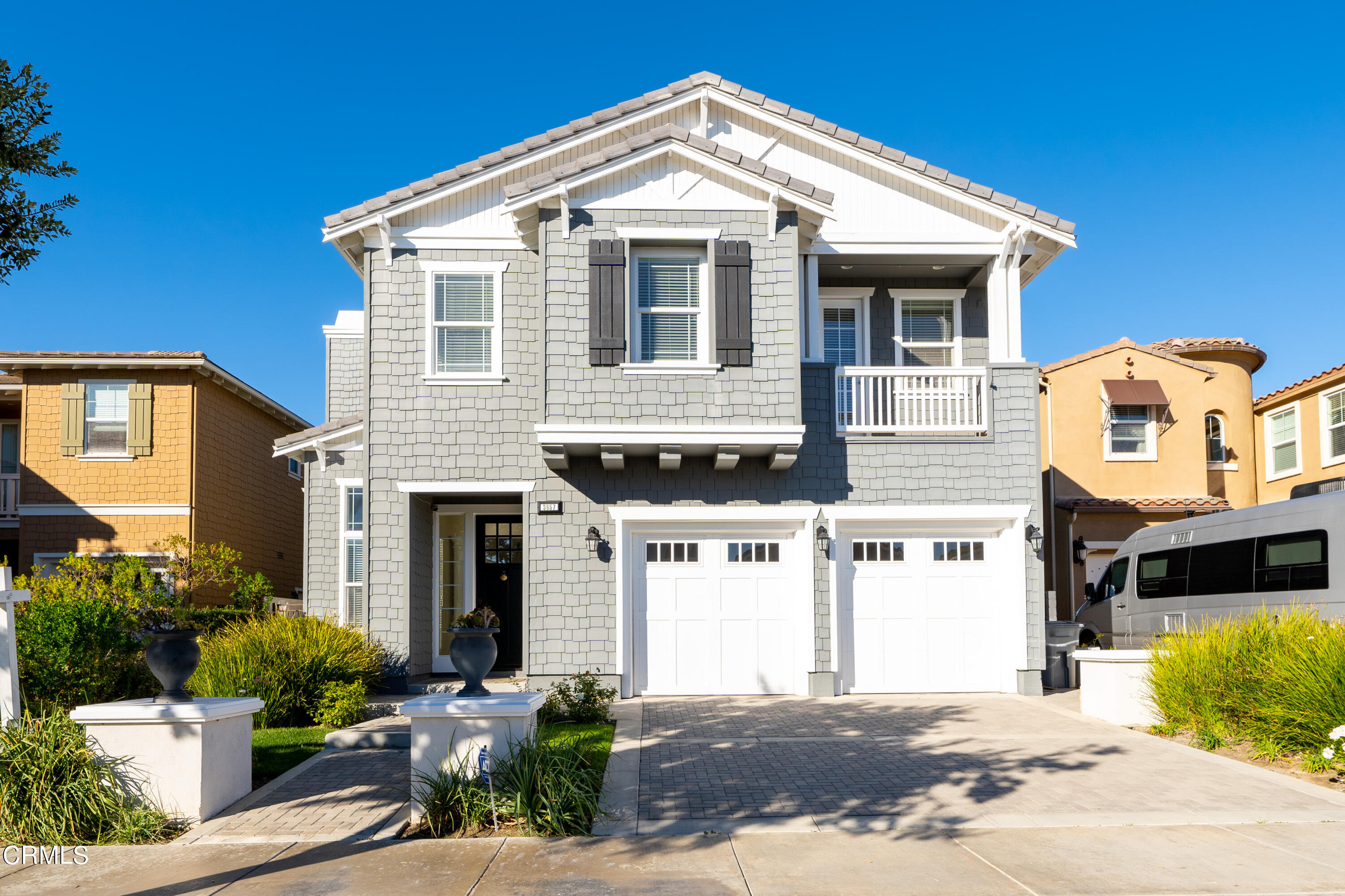 3957 West Hemlock Street Oxnard, CA 93035 - Photo 46 of 46 a front view of a house with a yard