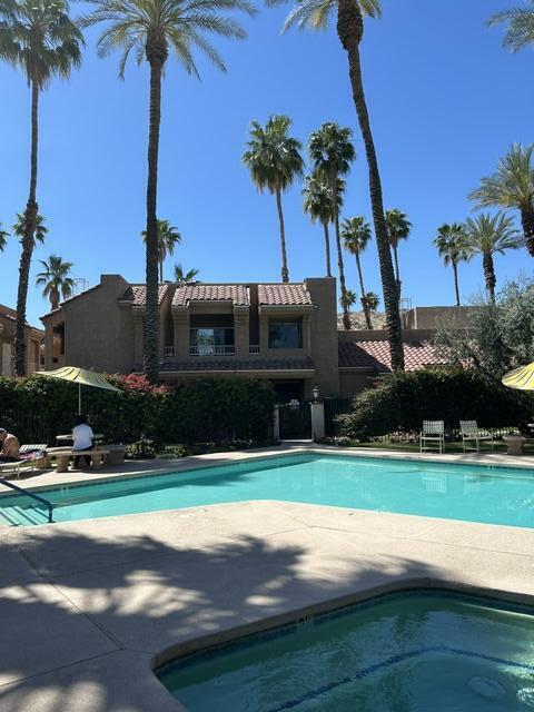 2700 Lawrence Crossley Road, Unit 18 Palm Springs, CA 92264 - Photo 2 of 7 a view of a yard with palm trees