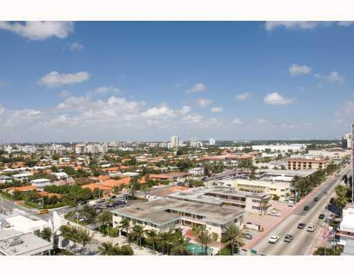 9273 Collins Avenue, Unit 1109 Surfside, FL 33154 - Photo 8 of 8 an aerial view of residential building and car parked