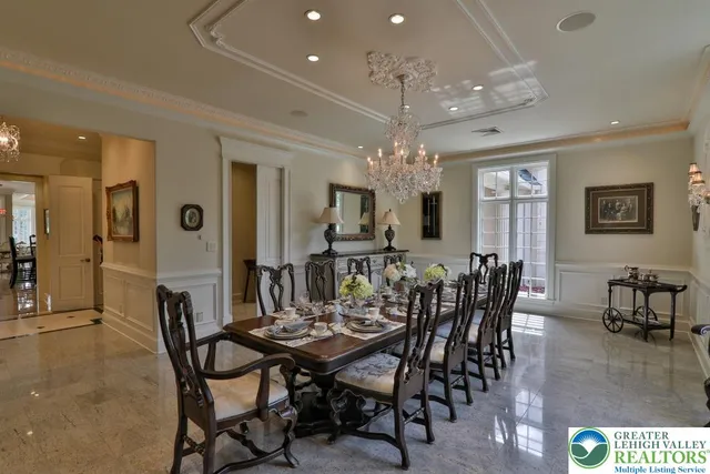 a media room with lots of chairs and a projector