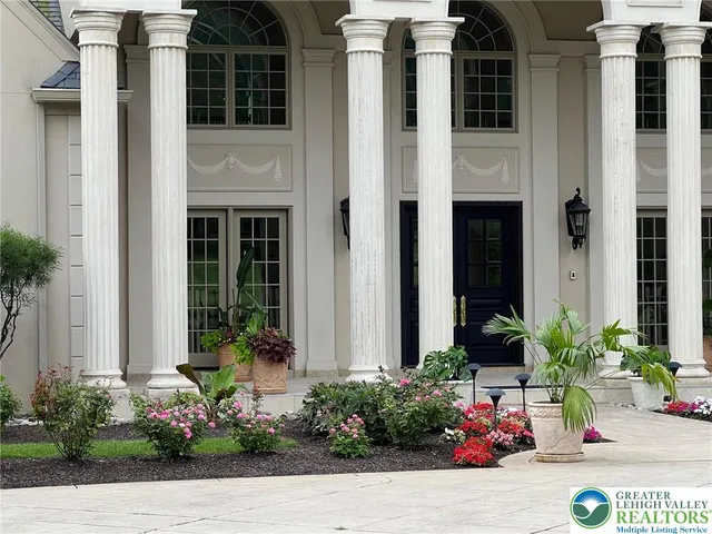 a front view of a house having yard