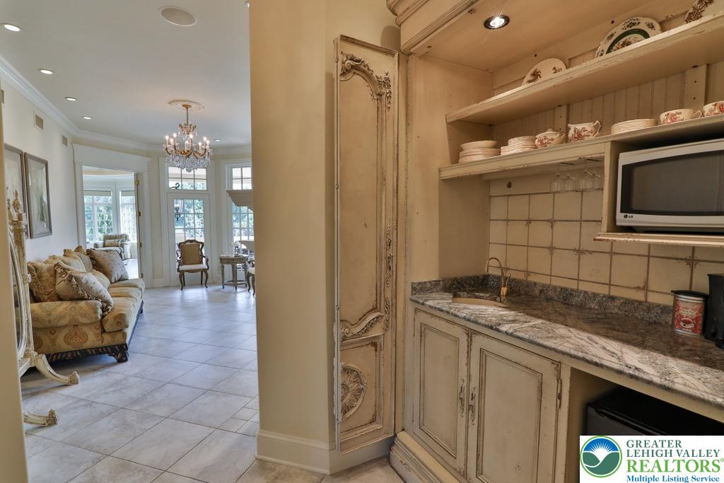 5044 Vera Cruz Road Center Valley, PA 18034 - Photo 32 of 100 a spacious bathroom with a granite countertop sink a mirror and shower