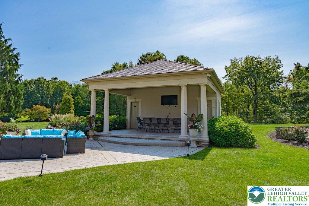 5044 Vera Cruz Road Center Valley, PA 18034 - Photo 82 of 100 a front view of a house with a yard