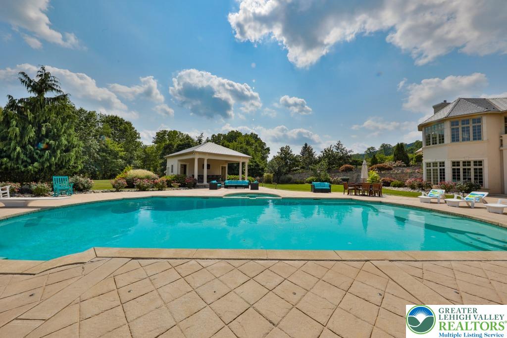 5044 Vera Cruz Road Center Valley, PA 18034 - Photo 87 of 100 a view of a house with a swimming pool